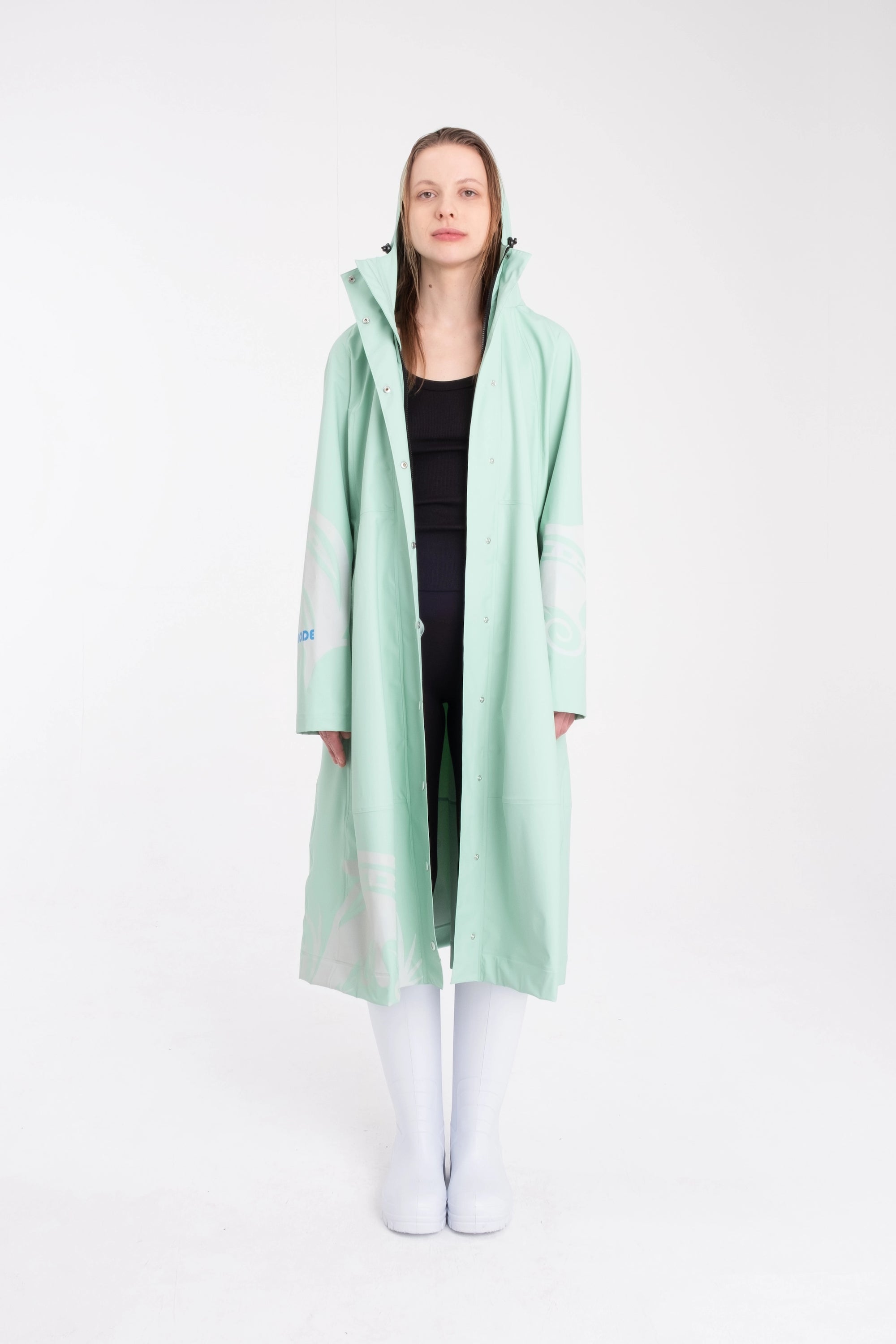 One NODE Scandinavian raincoat Reflex Mint for women – a waterproof and windproof jacket with reflective details for enhanced visibility, designed for all-weather protection